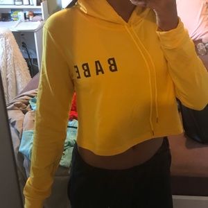 yellow sweatshirt